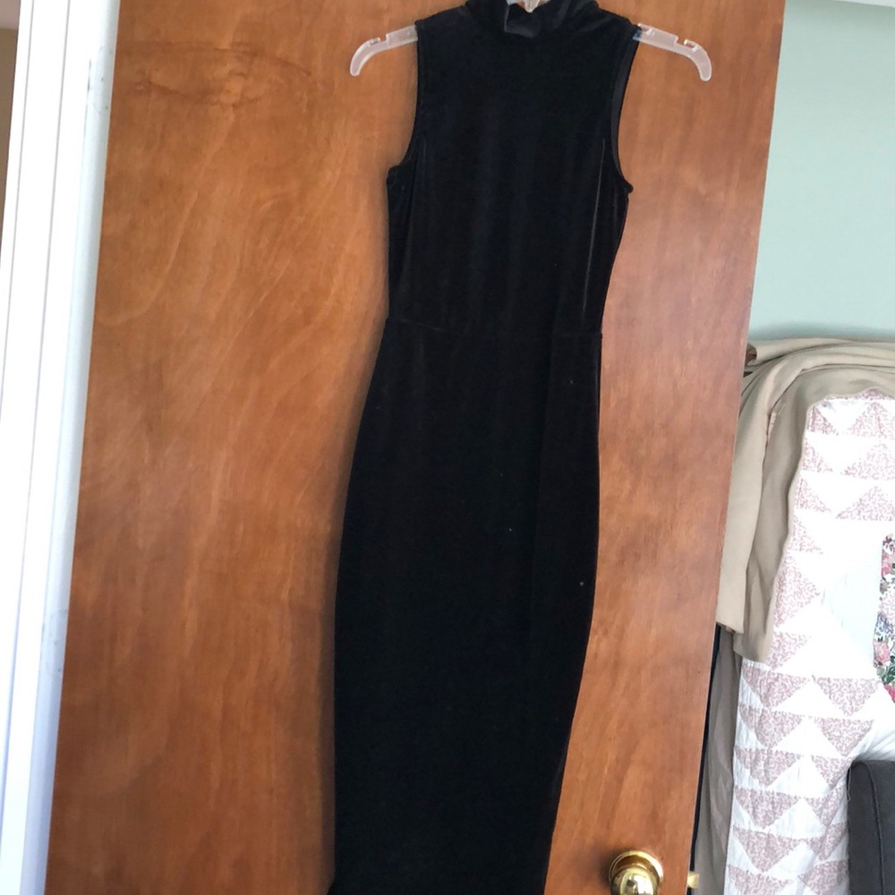 Black velvet midi dress with open back